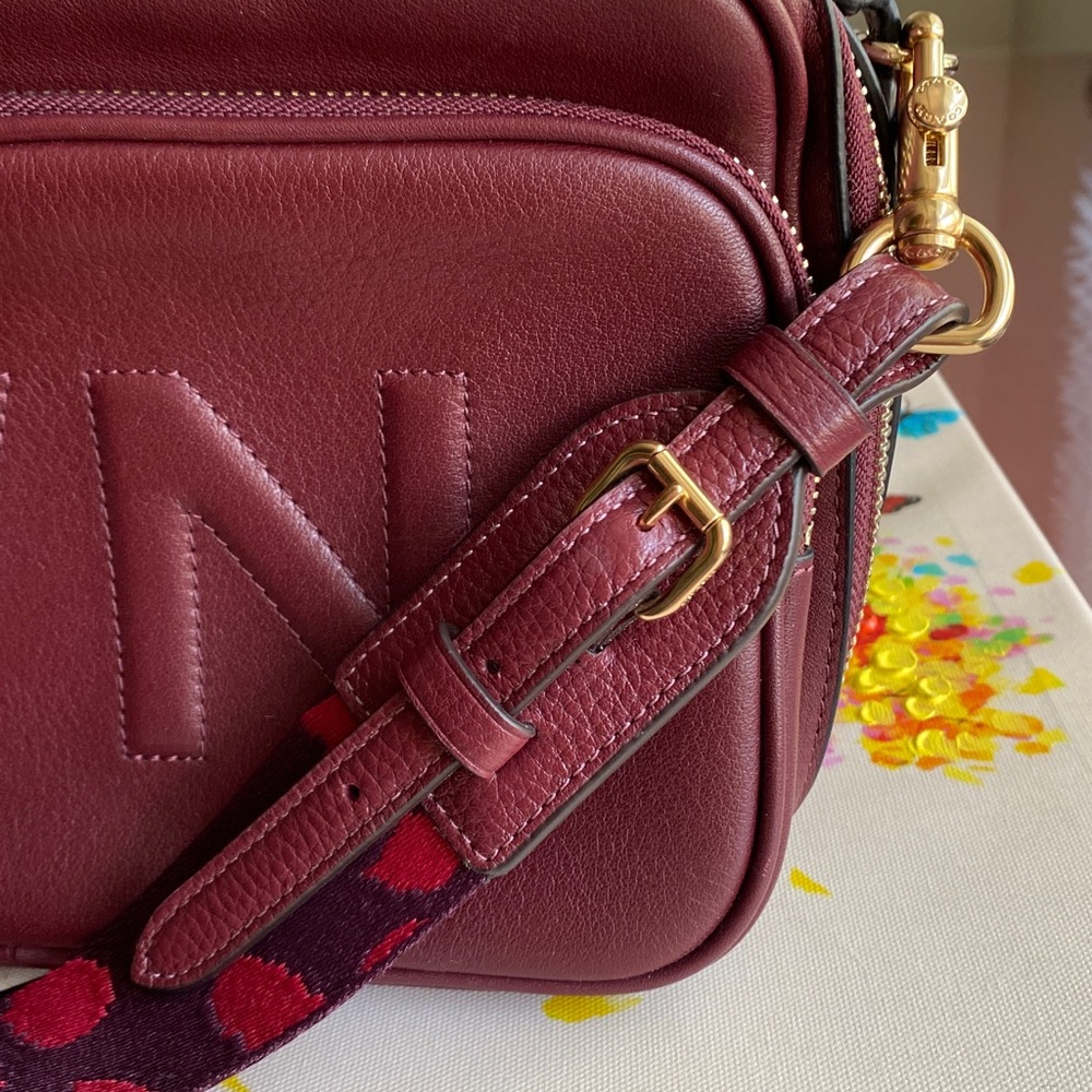 Coach strap with Leatherology Meadow Large Satchel Burgundy shoulder bag.